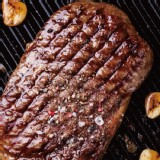 美國安格斯總統級霜降牛排~比臉大