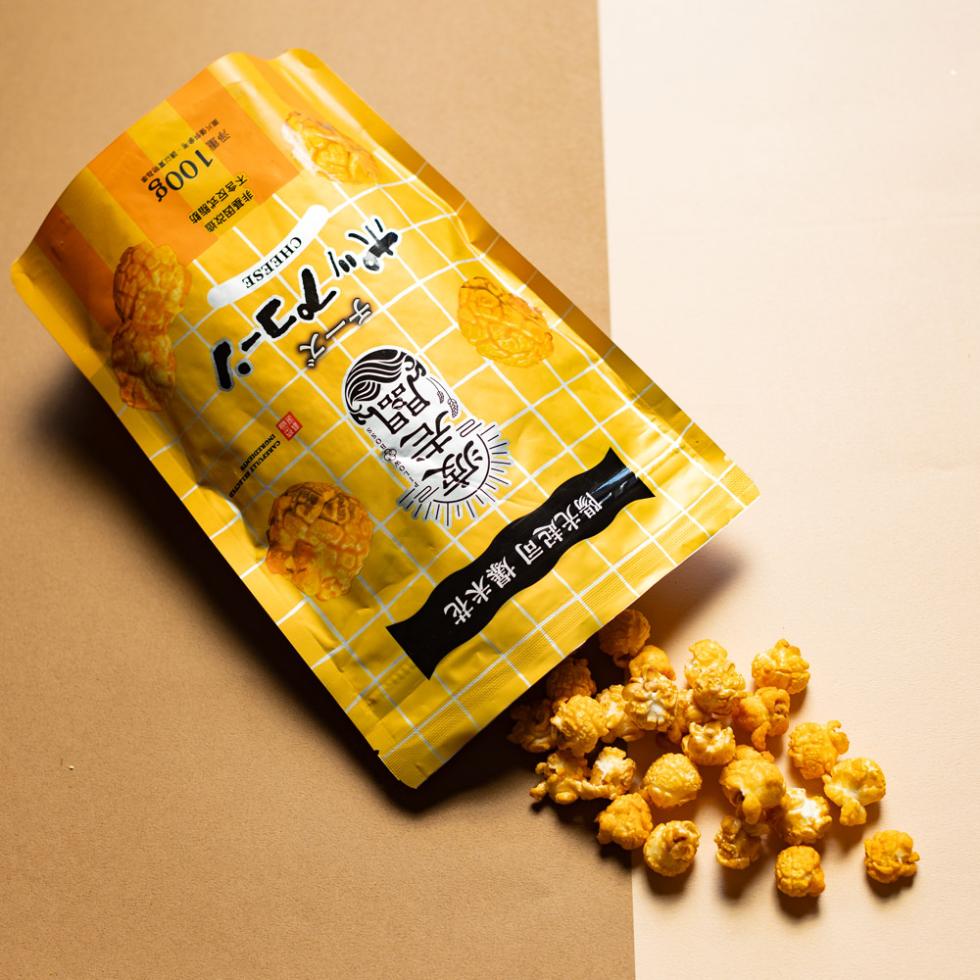 ← 陽光起司 爆米花，チーズ，ポップコーン，·非基因改造，不含反式脂肪:重100g。