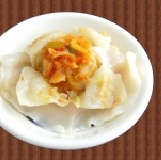 激辣鮮肉泡菜水餃～開店試吃價～5折 ～民國100歲生日快樂～享受人間美味～特製超大手工水餃～限時特價100元～ 特價：$50