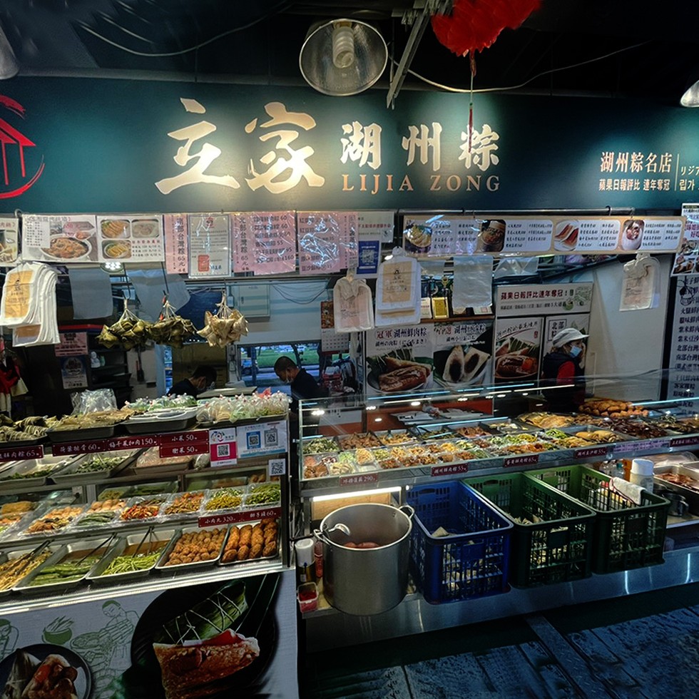 立家湖州粽，梅干菜扣肉150²，小米50.糖果50.小南天 120，B253號，S160元，冠軍湖州鲜肉粽 NH，蘋果日報評比連年8318，SEA精，湖州粽名店 -蘋果日報評比 連年奪冠水，o中lone XPER，大UFF，即LIS，北米鲜代，北米沙