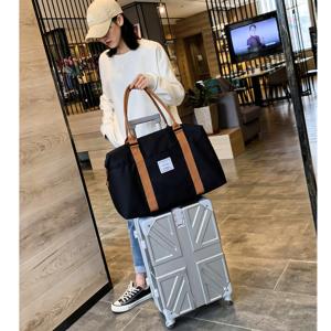 【西格生活館】日系大容量手提旅行袋 防潑水 旅行包 行李袋 登機包 行李箱拉桿包